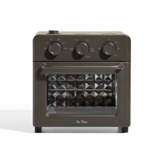 Compact electric oven with three control knobs and glass door.