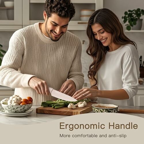 Smiling couple cooking together in kitchen with ergonomic knife.