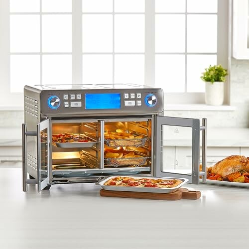 Digital toaster oven with open doors showing food inside.