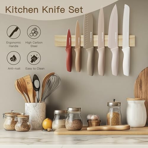 Kitchen knife set on magnetic strip with utensils and jars on counter.