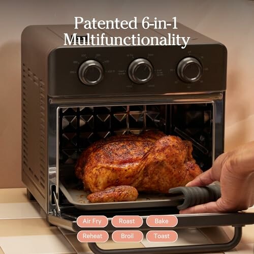 Multifunctional air fryer with chicken being cooked