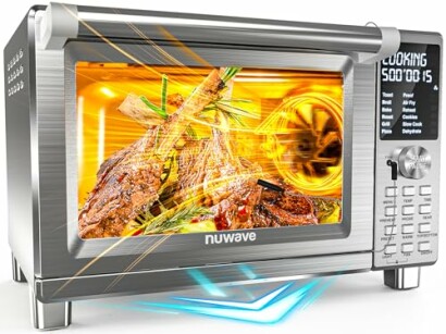 Nuwave air fryer oven cooking meat with digital display.